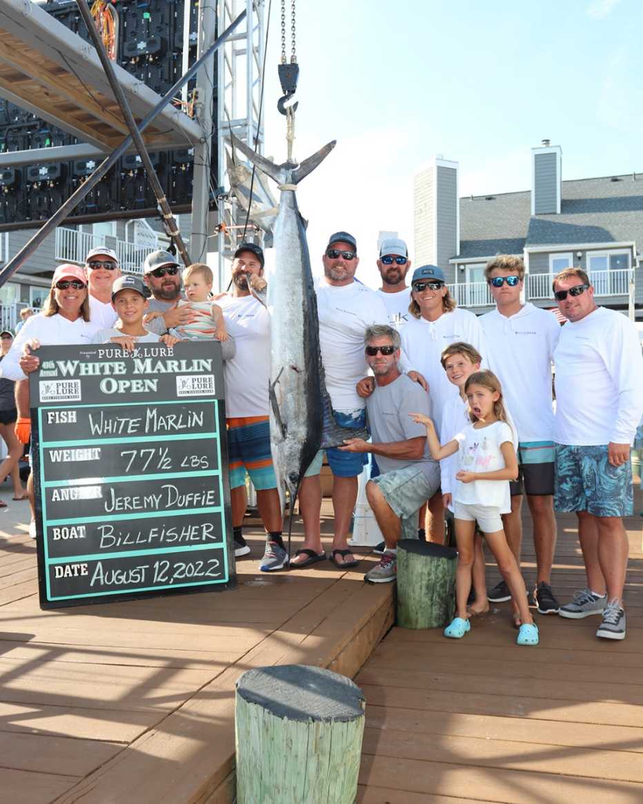 jeremy duffie poses with his prize winning catch