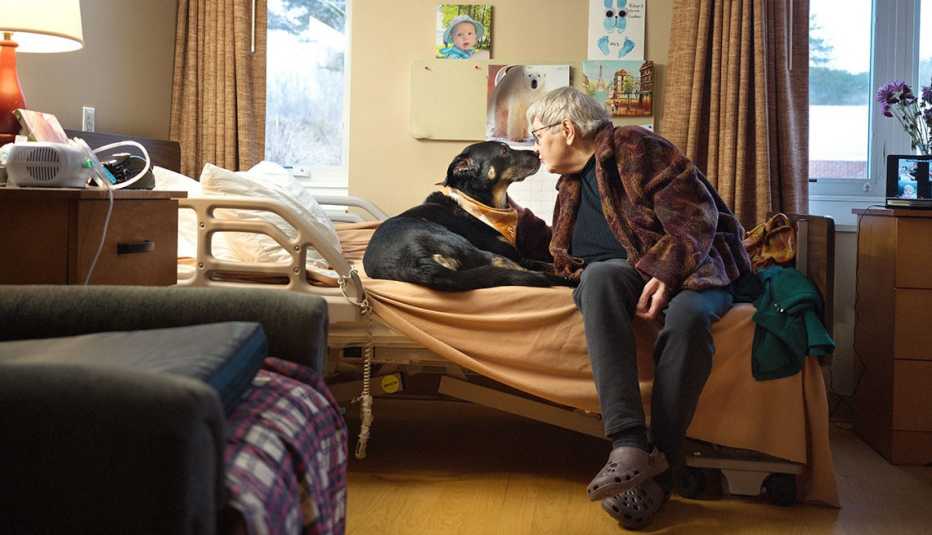 Scout embracing a resident