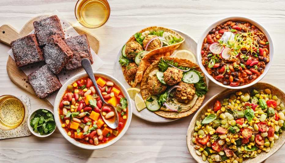 dishes made with beans such as bean brownies and northern bean soup and falafel tacos and chili and succotash