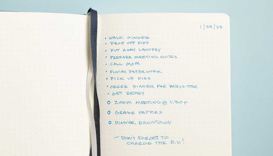 an open notebook showing an example of how to migrate, reflect, repeat.