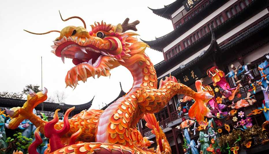 Colourful lantern shaped of a Chinese the Dragon are put up on the street in the central of Yuyuan old town in Shanghai.