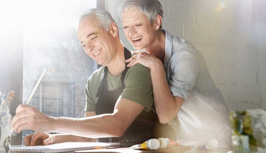 A couple painting together