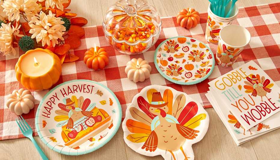 an array of thanksgiving decorations from dollar general including thanksgiving paper plates candles napkins and containers an array of thanksgiving decorations from dollar general including thanksgiving paper plates candles napkins and containers