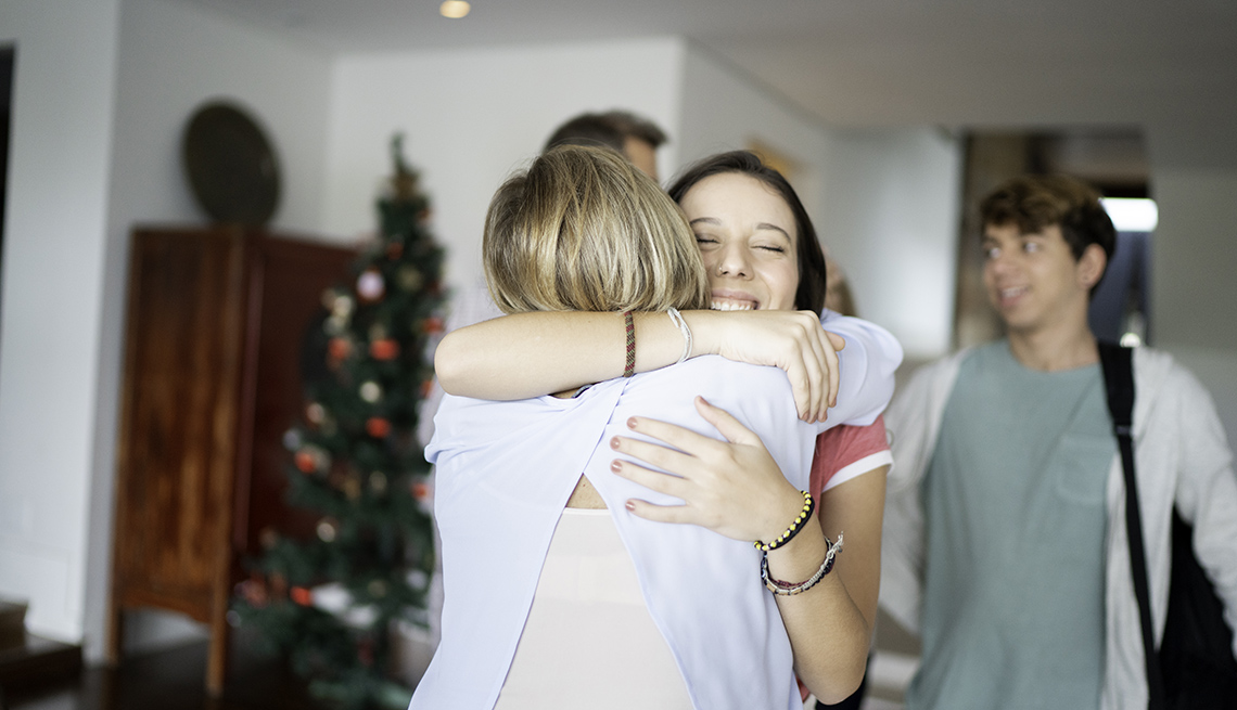 Family embracing at a Holiday gathering