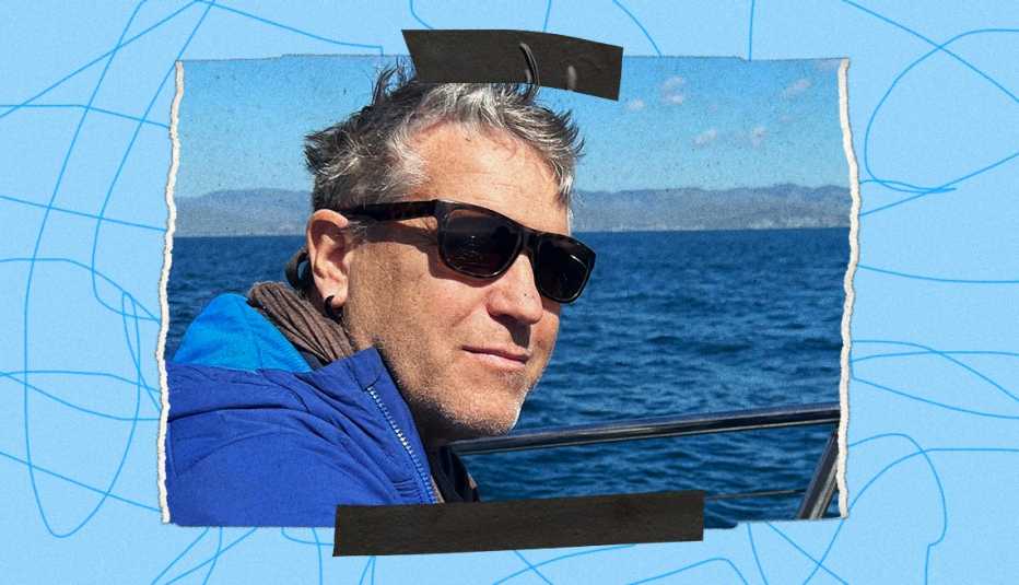 Black tape on top and bottom of a snapshot of Crai S. Bower wearing a winter coat while on a boat, blue water in the background. The photo is bordered by a blue background with squiggly lines. Black tape on top and bottom of a snapshot of Crai S. Bower wearing a winter coat while on a boat, blue water in the background. The photo is bordered by a blue background with squiggly lines.