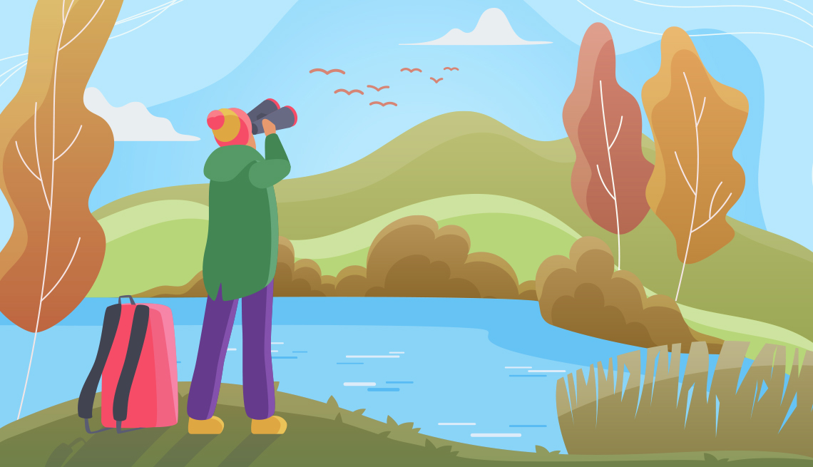 a person in nature birdwatching