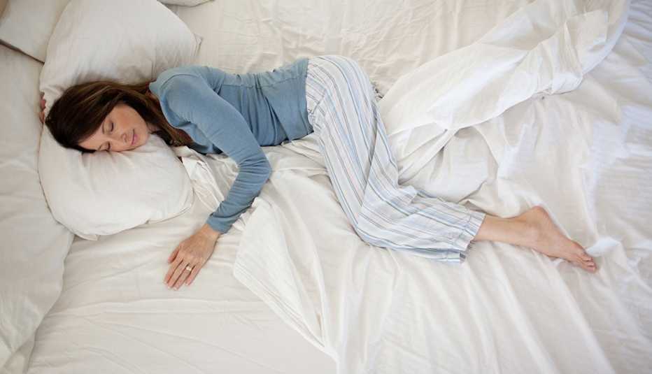 Woman sleeping in bed