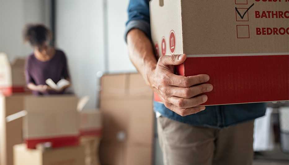 Closeup of man hand holding cardboard 