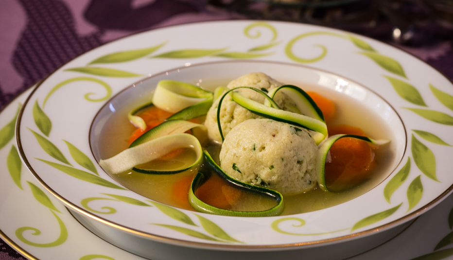 chicken soup with chicken meatballs and zucchini spagetti