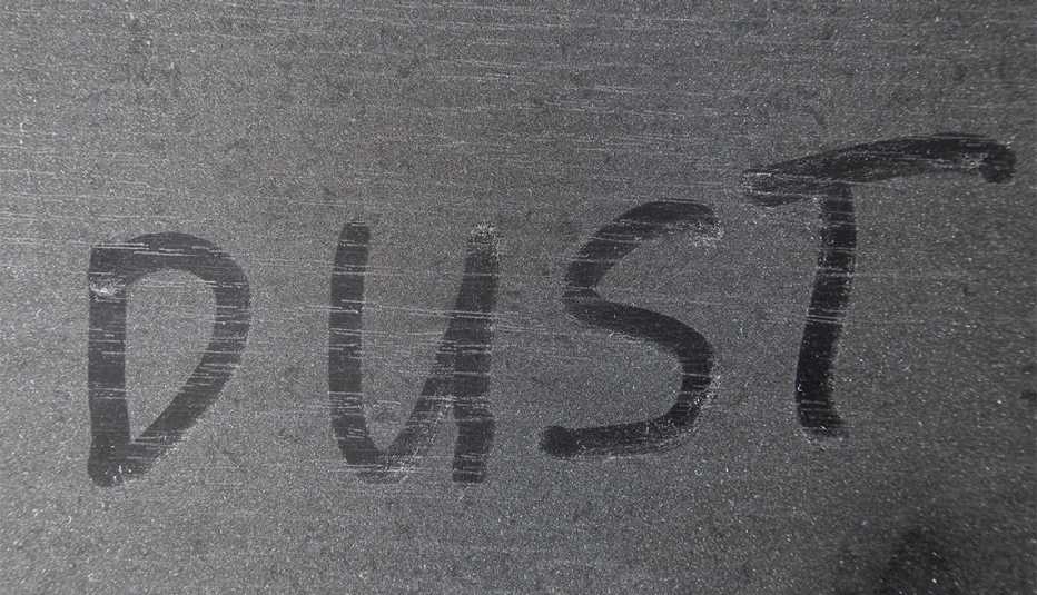 Dusty surface with written marking Dusty surface with written marking