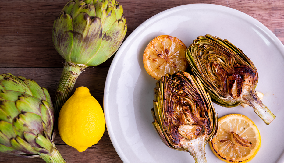 a plate of lemon roasted artichokes