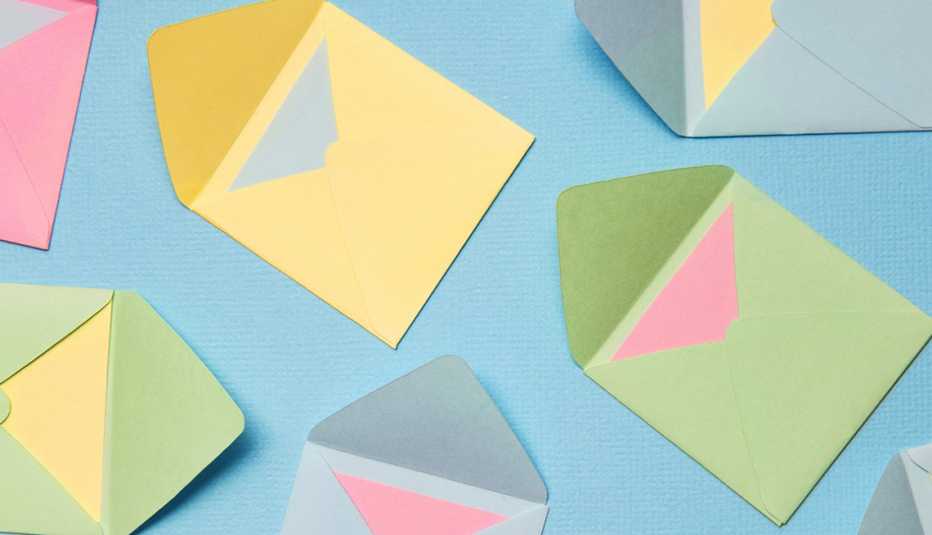 Pastel Coloured Envelopes On Blue Background