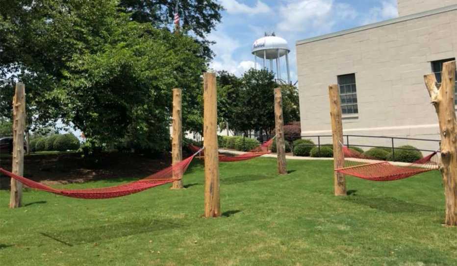 Three relaxing hammocks, acquired with funds from the AARP Community Challenge, was Monroe, Georgia
