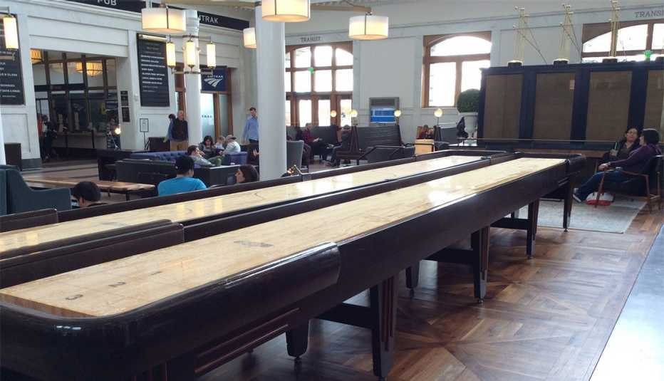 The waiting area of Denver's historic Union Station features couches and games.