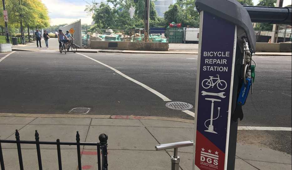A bicycle repair kiosk in Washington DC includes tools bicyclists need for emergency repairs