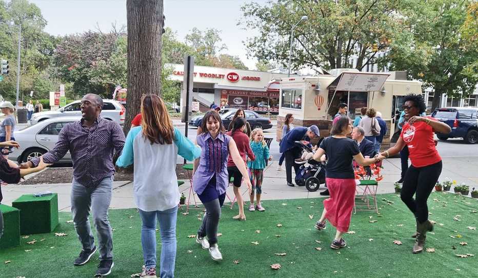 Neighbors dance at a block party in Washington D.C.