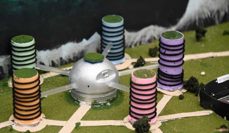 A multi-colored high-rise housing complex in the Pittsburgh team's Future City Competition display.