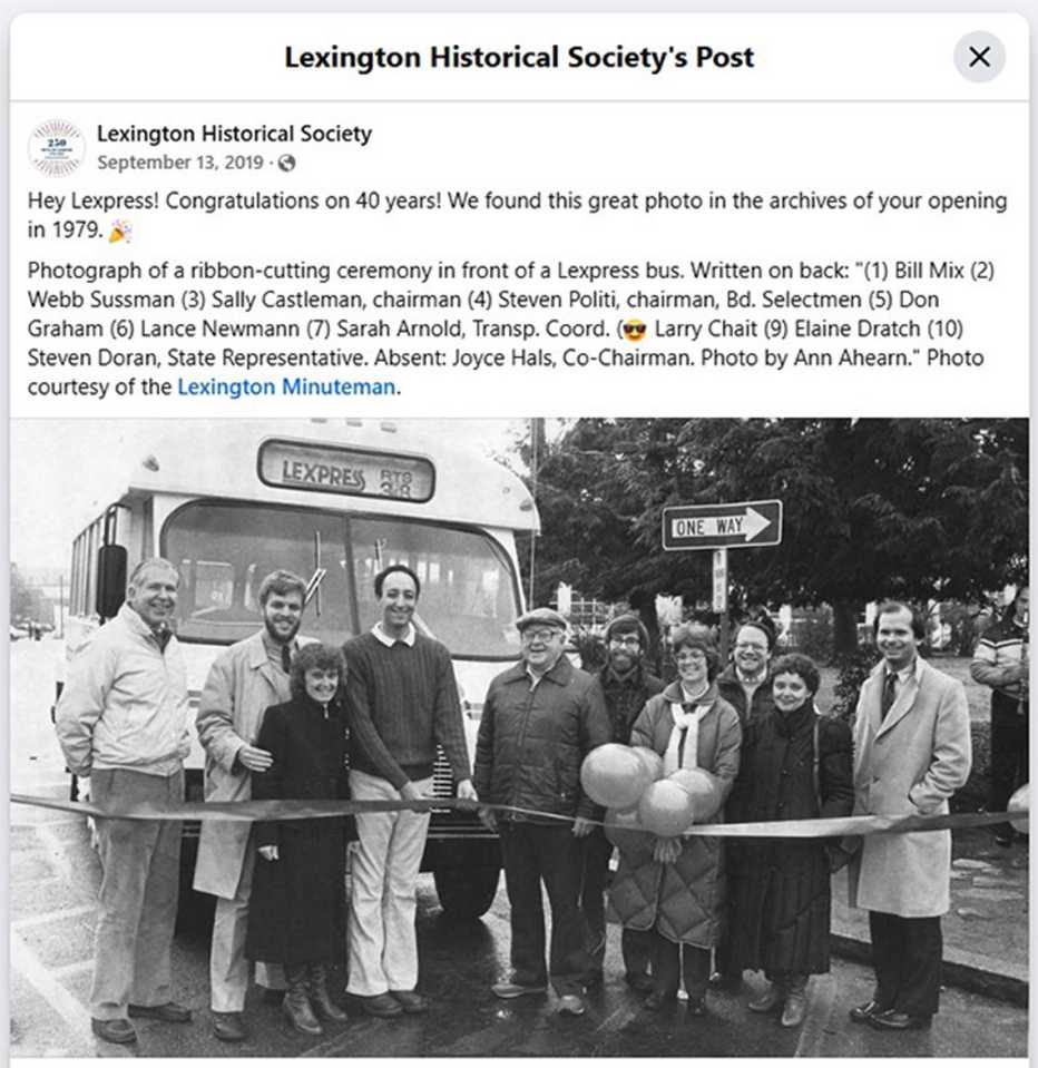 A Lexington Historical Society Facebook post from 2019 shows a black-and-white image of several community members and local leaders at  the 1979 ribbon-cutting for the Lexpress bus service in Lexington, Massachusetts