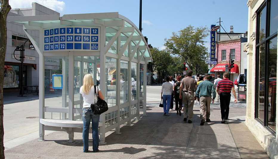 Sheltered Bus Stop, Woman, Group Of Men Walking On Sidewalk, Livable Communities, Mid Range Community Projects Sheltered Bus Stop, Woman, Group Of Men Walking On Sidewalk, Livable Communities, Mid Range Community Projects