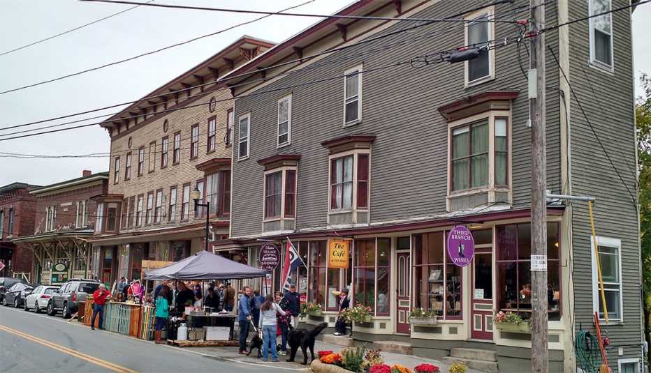 Two parking spots become a parklet and gathering spot.