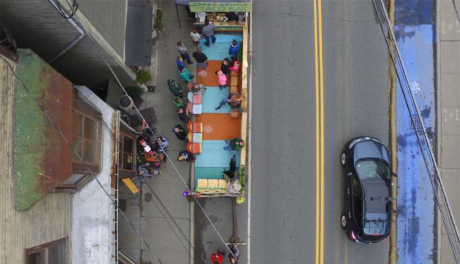 An aerial view of the Blue Land and sidewalk parklet.