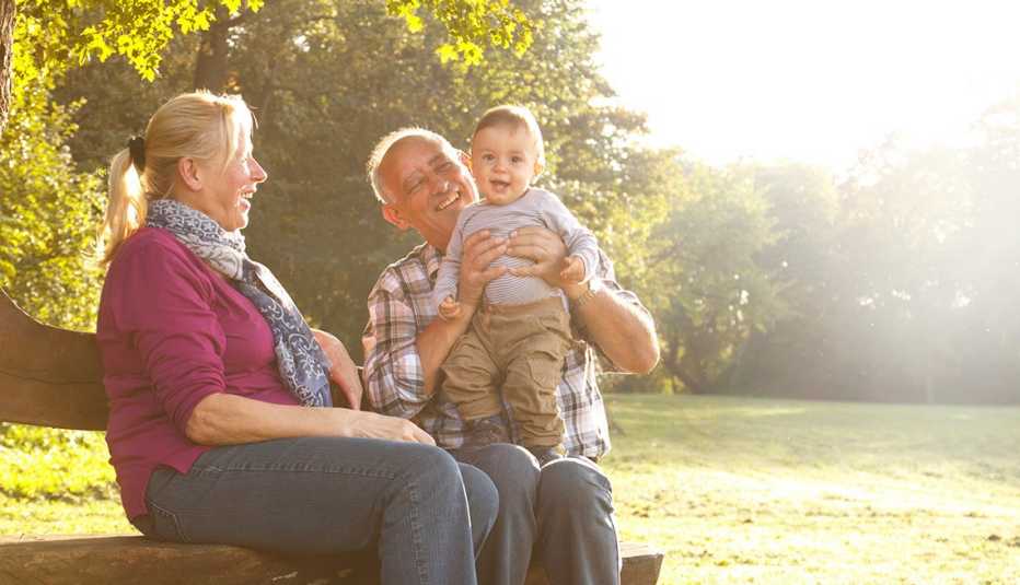 Grandparents Play With Grandson In Park, Trees, In Livable Communities Slideshow