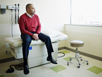 doctor shortage waiting patient exam room window man