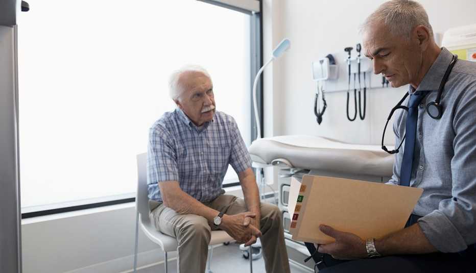 Doctor talking with patient
