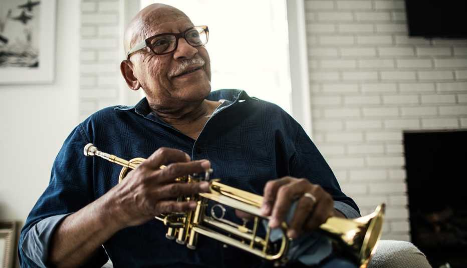 man holding trumpet