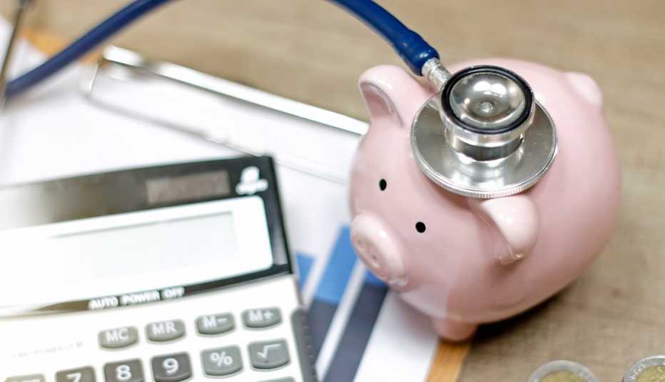 stethoscope and calculator symbol for health care costs or medical insurance