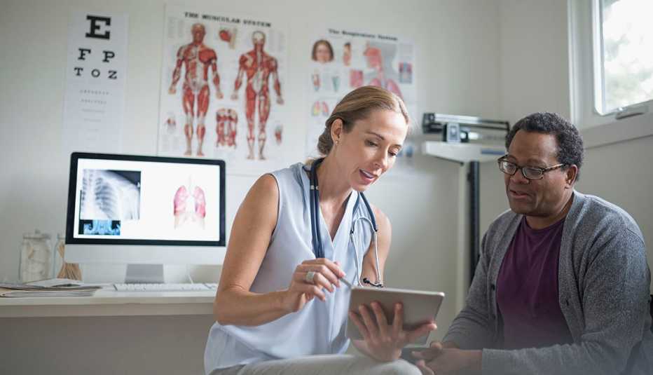 older patient in consultation with doctor