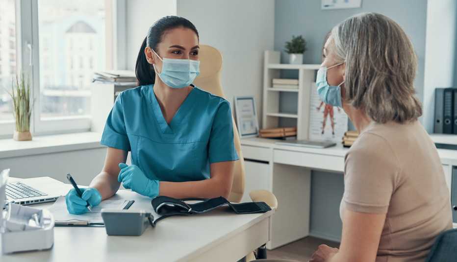 nurse and patient talking