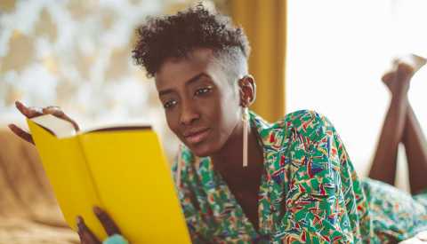 Woman reading on bed Woman reading on bed