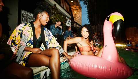 2 young women swimming pool 2 young women swimming pool