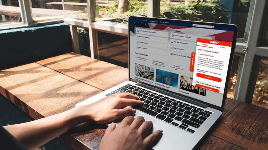 person with hands on laptop showing website with Perks browser extension displayed