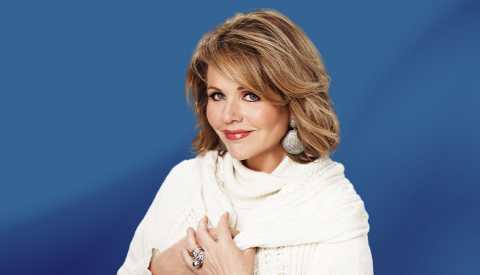 Renée Fleming against blue ombre background