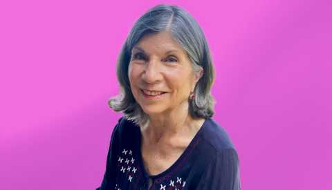 anna quindlen against purple ombre background