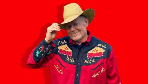 Brian Noyes cutout photo on a red background.