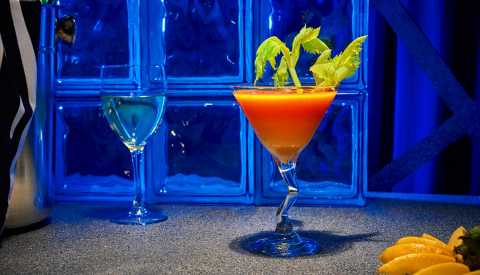 glass of bloody 'tini and glass of white wine