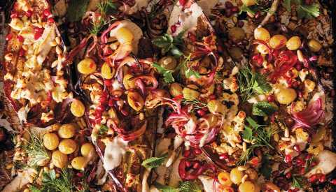 eggplant with grapes, feta, lemony tahini and spices