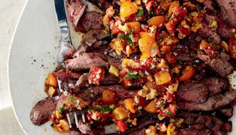 skirt steak with salsa on plate