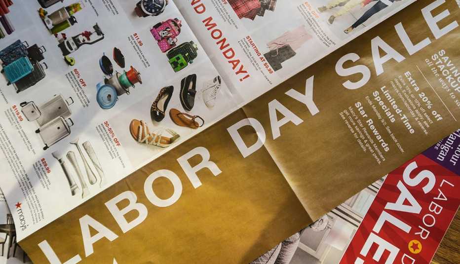 Labor Day sales close up of newspaper ads