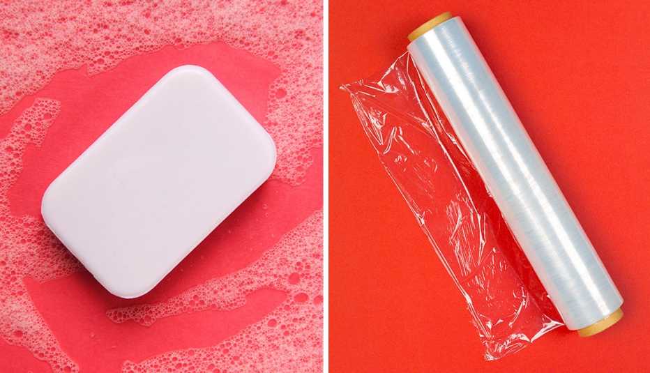 a bar of soap and a roll of kitchen plastic wrap