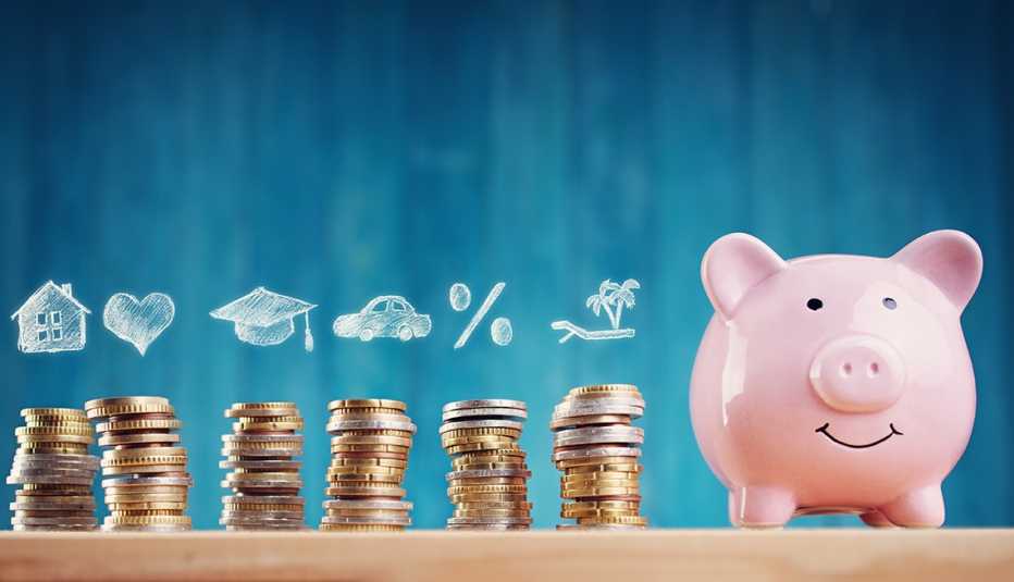Piggy bank next to stacks of coins with illustrations of home budget categories drawn in chalk on a blue background