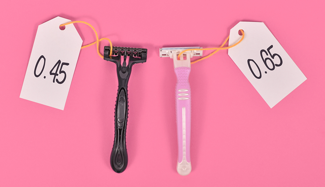 A side-by-side comparison of a black disposable men's razor priced at .45 cents next to the same women's razor in pink priced at .65 cents.