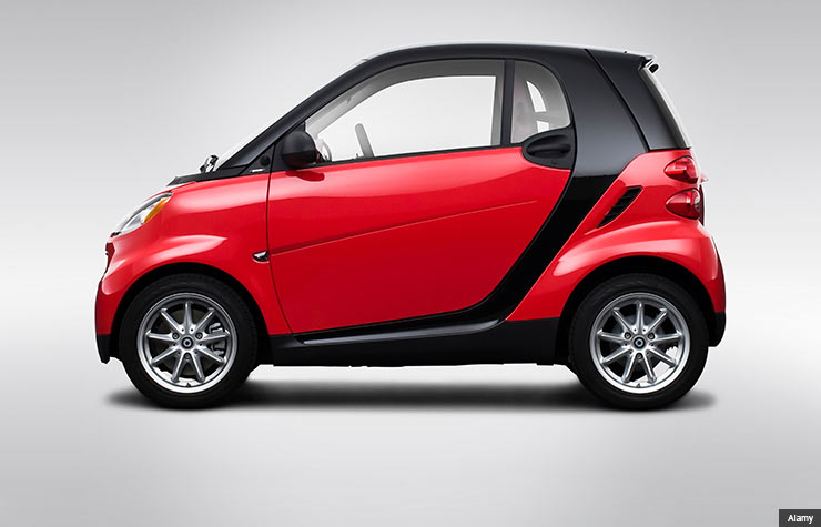 Red hatchback vehicle (Alamy)