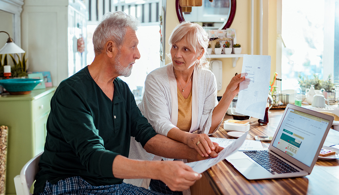 Couple at a computer doing home finances