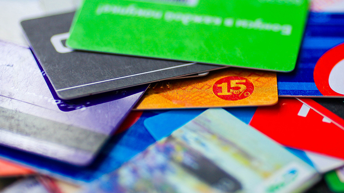 a pile of brightly colored gift cards