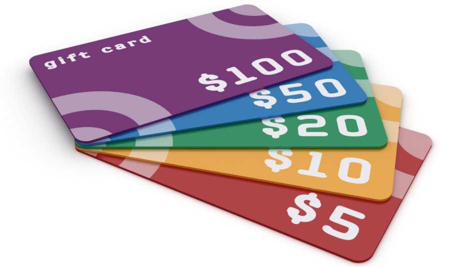 Colorful simply designed gift cards of the different value. Isolated on white background.