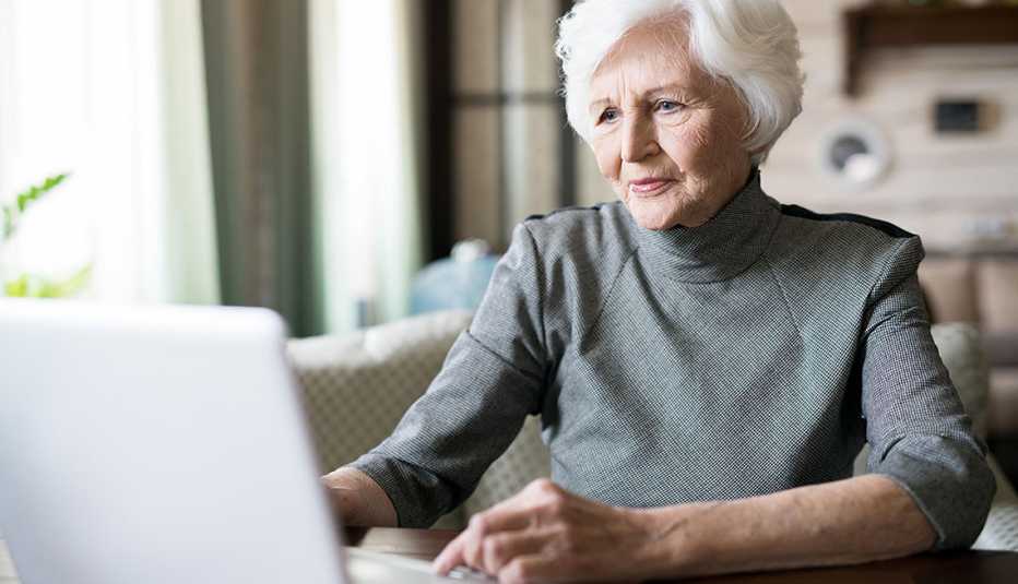 Senior woman using laptop